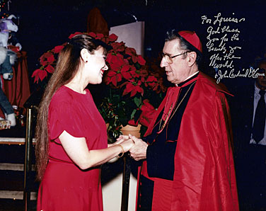 Louisa Jonason with Cardinal John O'Connor